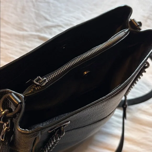 Coach, leather bucket bag with gun metal hardware extra Crossbody strap!